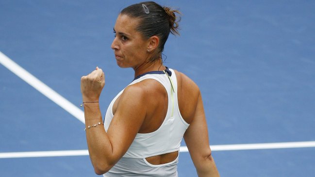 Flavia Pennetta avanzó a su primera final de Grand Slam tras vencer a Simona Halep en el US Open Flavia Pennetta avanzó a su primera final de Grand Slam tras vencer a Simona Halep en el US Open