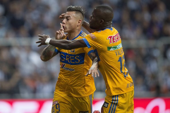Jugaron en el estadio de su clásico rival, fueron golpeados a los 2', y aún así, gracias a a un tremendo despliegue ofensivo coronado por Eduardo Vargas, Tigres UANL derrotó por 1-2 a Monterrey (2-3 en el global) y alzó el trofeo del Torneo de Apertura mexicano. Jugaron en el estadio de su clásico rival, fueron golpeados a los 2', y aún así, gracias a a un tremendo despliegue ofensivo coronado por Eduardo Vargas, Tigres UANL derrotó por 1-2 a Monterrey (2-3 en el global) y alzó el trofeo del Torneo de Apertura mexicano.