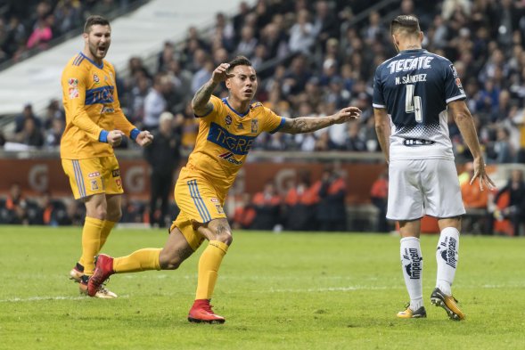 Jugaron en el estadio de su clásico rival, fueron golpeados a los 2', y aún así, gracias a a un tremendo despliegue ofensivo coronado por Eduardo Vargas, Tigres UANL derrotó por 1-2 a Monterrey (2-3 en el global) y alzó el trofeo del Torneo de Apertura mexicano. Jugaron en el estadio de su clásico rival, fueron golpeados a los 2', y aún así, gracias a a un tremendo despliegue ofensivo coronado por Eduardo Vargas, Tigres UANL derrotó por 1-2 a Monterrey (2-3 en el global) y alzó el trofeo del Torneo de Apertura mexicano.