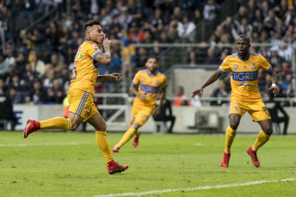 Jugaron en el estadio de su clásico rival, fueron golpeados a los 2', y aún así, gracias a a un tremendo despliegue ofensivo coronado por Eduardo Vargas, Tigres UANL derrotó por 1-2 a Monterrey (2-3 en el global) y alzó el trofeo del Torneo de Apertura mexicano. Jugaron en el estadio de su clásico rival, fueron golpeados a los 2', y aún así, gracias a a un tremendo despliegue ofensivo coronado por Eduardo Vargas, Tigres UANL derrotó por 1-2 a Monterrey (2-3 en el global) y alzó el trofeo del Torneo de Apertura mexicano.