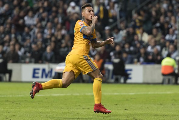 Jugaron en el estadio de su clásico rival, fueron golpeados a los 2', y aún así, gracias a a un tremendo despliegue ofensivo coronado por Eduardo Vargas, Tigres UANL derrotó por 1-2 a Monterrey (2-3 en el global) y alzó el trofeo del Torneo de Apertura mexicano. Jugaron en el estadio de su clásico rival, fueron golpeados a los 2', y aún así, gracias a a un tremendo despliegue ofensivo coronado por Eduardo Vargas, Tigres UANL derrotó por 1-2 a Monterrey (2-3 en el global) y alzó el trofeo del Torneo de Apertura mexicano.