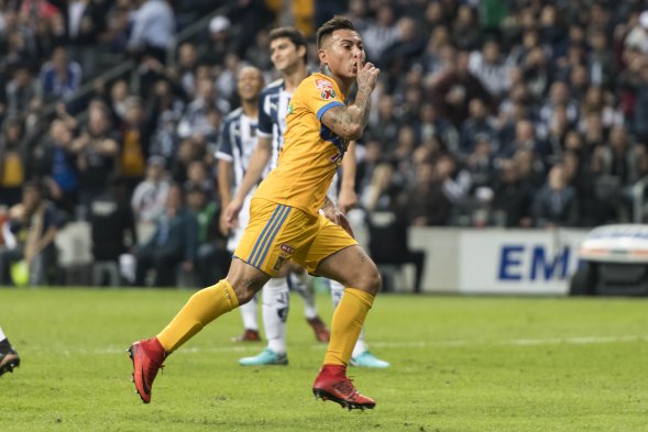Jugaron en el estadio de su clásico rival, fueron golpeados a los 2', y aún así, gracias a a un tremendo despliegue ofensivo coronado por Eduardo Vargas, Tigres UANL derrotó por 1-2 a Monterrey (2-3 en el global) y alzó el trofeo del Torneo de Apertura mexicano. Jugaron en el estadio de su clásico rival, fueron golpeados a los 2', y aún así, gracias a a un tremendo despliegue ofensivo coronado por Eduardo Vargas, Tigres UANL derrotó por 1-2 a Monterrey (2-3 en el global) y alzó el trofeo del Torneo de Apertura mexicano.