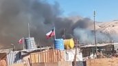 Incendio afecta a dos sitios de una toma en Calama